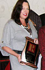 Debra receives 20-year plaque